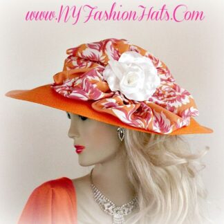 Women's Orange Wide Brimmed Fashion Hat, With An Orange, White, And Pink Fabric Bow. A Lovely White Rose, Give This Hat Such Elegance. A Perfect Hat, For Weddings, Church, Temple, Formals, Tea's, And Special Occasions. By www.NYFashionHats.ComNYFashionHats Haute Couture Millinery Headwear For Women https://nyfashionhats.etsy.com