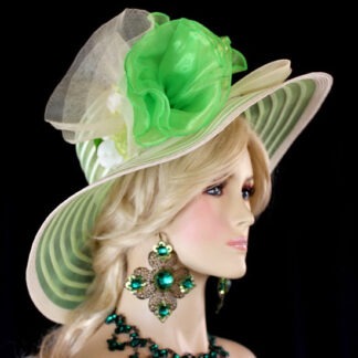 Ladies Sheer Ivory And Lime Green Haute Couture Wide Brim Dress Hat For Weddings And The Kentucky Derby. This Feminine Hat Is Trimmed With A Large Ivory And Lime Green Netting Crinoline Bow Mixed With A Lime Green Nylon Bow, Enhanced With Lovely Pastel Celery Green, Lime Green And Ivory Custom Millinery Flowers Accented With Kelly Green Vintage Millinery Silk Leaves. This Spring Designer Hat Is Suited For The Kentucky Derby, Horse Races, Horse Racing Events, And Special Occasion. This Beautiful Couture Fashion Chapeaux Hat Is Custom Made And Designed Hats Womens.