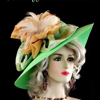 Ladies Lime Green Wide Brim Formal Fashion Kentucky Derby Hat. This Custom Made Women's Designer Hat Is Embellished With A Large Paisley Lime Green And Golden Yellow Paisley Embroidered Bow, Accented With A Gold Large Organza Bow.  Ivory Feathers Are Placed Inside The Bow For Added Style. This Beautiful Designer Hat Is Suited For A Bride To Be On Her Wedding Day, Horse Races, The Kentucky Derby, Breeder's Cup, Maryland Million Day, Iroquois Steeplechase Horse Races, The Melbourne Cup, The Royal Ascot, Church, Weddings, Formals, And Special Occasion. This Fashion Hat Is Custom Made By Women's Hats, hatswomens.com.