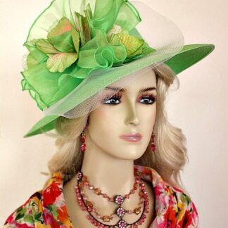 Ladies Lime Green Wide Brim Haute Couture Special Occasion Kentucky Derby Hat With A Lime Green And Ivory Bow, Adorned With Lime Green And Pink Velvet Flowers, And Lime Green Silk Millinery Leaves. This Dress Hat Is Also Trimmed With A Velvet Organza Hat Band With White and Brown Glass Beads, With Diamond Shaped Rhinestones.This Designer Hat Is Suited For Horse Racing Events. We Specialize In Church Hats, Designer Hats, Women's Fashion Hats, Occasion Hats, And Wedding Hats. This Haute Couture Fashion Hat Is Custom Made And Designed By NY Fashion Hats, nyfashionhats.com