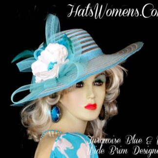 Ladies Turquoise Blue Haute Couture Avant Garde Designer Wide Brim Fashion Wedding Bridal Hat. This Turquoise Blue Formal Custom Made Hat, Is Trimmed With A Sheer Turquoise Blue Horse Hair (Crin) Bow, Accented With A Custom Made White Millinery Flower With A Turquoise Blue Satin Rosette In The Center.  Delicate Peacock Colored Feathers, Give This Hat Such Elegance. This Romantic Styled Hat, Will Make Any Women Feel Feminine. NYFashionHats.com