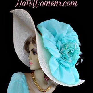 Ladies Ivory Beige Aqua Wide Lift-Up Haute Couture Brim Dress Custom Fashion Hat For Special Occasion. This Avant Garde Hat Is Embellished With A Large Pastel Turquoise Aqua Lightweight Fabric Bow Enhanced With A Beautiful Silk Pastel Turquoise Aqua Blue Millinery Flower. Delicate Ivory Feathers Are Placed Around The Flower For Added Design. Custom Made By NYFashionHats.com Headwear Millinery Apparel For Women.