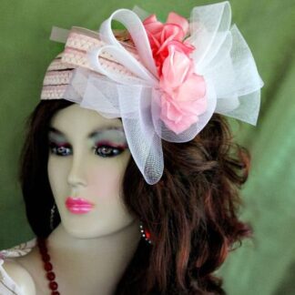 Women's Pink And White Cocktail Holiday Pillbox Hat, With A Large Sheer Bow, And Pink Flowers. We Specialize In Cocktail Hats For Women, Pillbox Hats With Veils, Wedding Fascinators, Hats With Feathers, Satin Dress Hats For Women, Hairband Hats, Bridal Headpieces, Hats For Brides, Hair Accessories For Women, Custom Designer Hats, Kentucky Derby Hats, Hats For Horse Races, Hats For Formals, Church Hats, And Special Occasion Hats. Custom Made And Designed By NY Fashion Hats Custom Millinery Headwear. https://www.nyfashionhats.com