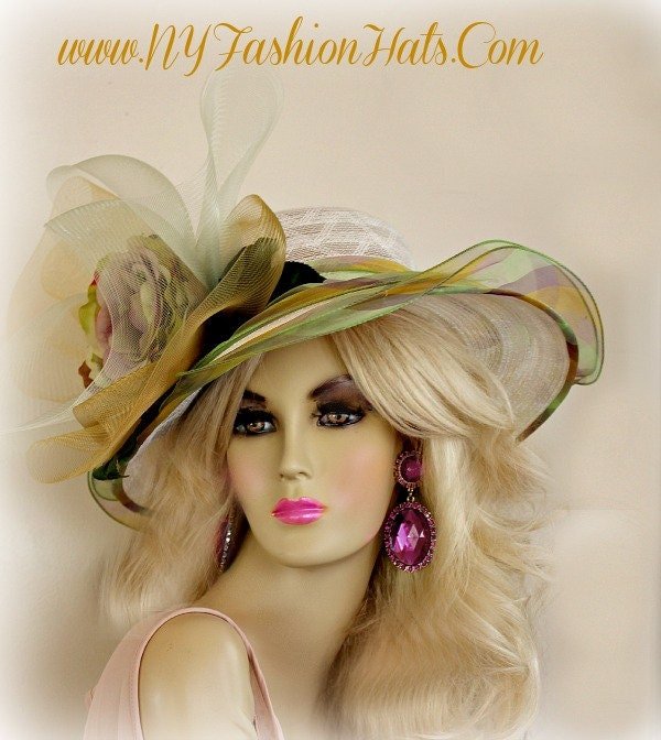 White Olive Green Purple Designer Kentucky Derby Horse Racing Hat, With Feathers And Flowers Ladies Hats. This Fashion Hat, Is Suited For Church, A Wedding, A Formal Affair, Dress Up, Horse Races, The Kentucky Derby, And Breeder's Cup. This Tea Hat, Is Suited For Winter, Spring, Summer Or Fall. We Specialize In Kentucky Derby Hats For Women, Dress Hats For Women Ladies Fashion Hats, Designer Hats For Weddings, Church Hats, Tea Party Hats, Ladies Formal Hats, Kentucky Oaks Hats, Preakness Hats, Belmont Stakes Hats, And Special Occasion Hats For Women. Custom Made And Designed By NY Fashion Hats Millinery Headwear. http://www.nyfashionhats.com