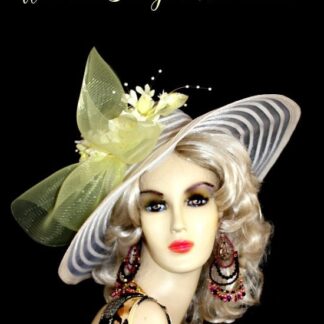Women's Sheer White Wide Brim Designer Dress Church Wedding Hat. This Feminine Dress Hat Is Trimmed With A Large Sheer Yellow Crinoline Netting Bow Accented With Hand Dyed Yellow Silk Millinery Flowers And Rose Buds, Enhanced With Shooting White Pearls. This Exquisite Wedding Hat Is Custom Made And Designed By Women's Designer Hats At hatswomens.com - nyfashionhats.com