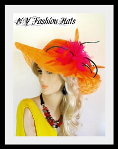Haute Couture Orange And Hote Pink Feathered Special Occasion Formal Wide Brimmed Fashion Hat For Stylish Ladies. By www.NYFashionHats.Com - A Perfect Kentucky Derby Hat. NYFashionHats Haute Couture Millinery Headwear For Women This Glamorous Scalloped Wide Brimmed Fashion Hat Is Embellished With Hot Pink Hackle Feathers Enhanced With Orange And Emerald Green Feathers.