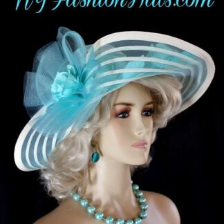 Ladies Sheer Wide Lift-Up Brimmed Turquoise Blue And Ivory Designer Kentucky Derby Fashion Church Hat With Turquoise Blue Silk Rose And Millinery Leaves. These Lovely Silk Roses Are Placed With The Crinoline Bow, And Along Side The Front Of This Dress Hat. This Special Occasion Hat Is Available In A Pink And Ivory Combination, A Lime Green And Ivory Combination, A Turquoise Blue And Ivory Combination, Solid Black, Solid White, And Solid Ivory. Customize This Versatile Hat - Choose Your Hat Color, Crinoline Bow Color, And Rose Colors. This Dress Hat Is Suited For Church, Wedding Guests, Brides, Bridesmaids, Easter, And Mother of the Bride or Groom