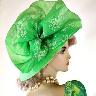 Ladies Lime Green Wide Brim Fashion Kentucky Derby Hat.  This dress hat is adorned with a large lime green sheer organza fabric bow with a beautiful pattern. This is a custom made hat. This dress hat is suited for Winter, Spring, Summer And Fall. A perfect special occasion hat for weddings, formals, Church, horse races, the Kentucky Derby, and holidays.
