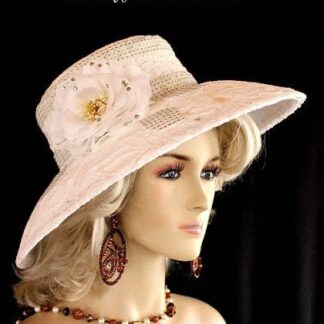 Ladies White Wide Brim Embroidered Pattern Formal Fashion Wedding Mother Of The Bride Hat With Acrylic Rhinestones. This Custom Made Women’s Designer Hat Is Embellished With A Silk Rose. Acrylic Rhinestones Encircle The Crown Of This Hat. The Same Rhinestones Are Placed Along The Brim In A Partial Diamond Pattern.  This Formal Hat Is Suited For A Bride To Be On Her Wedding Day, Horse Races, The Kentucky Derby, Breeder’s Cup, Maryland Million Day, Iroquois Steeplechase Horse Races, The Melbourne Cup, The Royal Ascot, Church, Weddings, Formals, And Special Occasion. This Fashion Hat Is Custom Made By Women’s Hats, hatswomens.com.