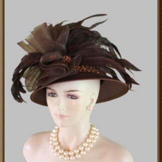 Haute Couture Brown Satin Abstract Brim Designer Luxury Statement Hat For Women. This High Fashion Hat Is Adorned With A Large Brown Horsehair Bow Trimmed With Exotic Iridescent Brown Rooster Coque Feathers Accented With Handmade Brown Sequin Floral Pearl Appliques. A Very Expensive Brown Pearl And Glass Beaded Trim Encircles The Crown Of This Fabulous Hat. All Heads Will Turn When Your Wear This Beautiful Hat.