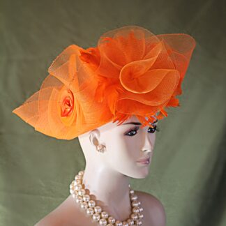 Haute Couture Orange Sheer Scallop Lift Up Brim Designer Fashion Hat For The Kentucky Derby And Special Occasion. This Custom Orange Designed Women's Dress Hat Is Trimmed With A Large Sheer Orange Horsehair Crinoline Bow, Enhanced With Beautiful Orange Hackle Feathers. Orange Bows With A Large Handmade Orange Satin Rosettes Are Placed Around The Lift Up Brim. This Haute Couture Versatile Fashion Hat Can Be Worn In Different Positions On The Head.