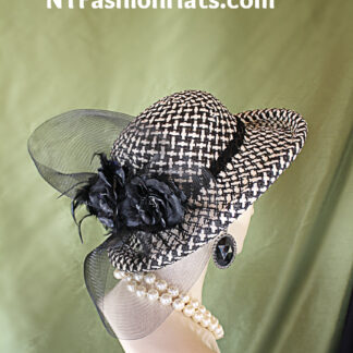 Women's Black And White Fine Straw Rollup Brim Designer Fashion Hat. This Elegant Luxury Statement Dress Hat Is Embellished With A Large Black Horsehair Crinoline Bow. Placed Within This Beautiful Large Bow Are Handmade Black Silk Vintage Roses Containing Black Pearl Stamens. A Delicate Black Sequin Trim Encircles The Lower Portion Of The Crown. This Is A Stylish Hat And Will Make A Fashion Statement. Classic In Design.