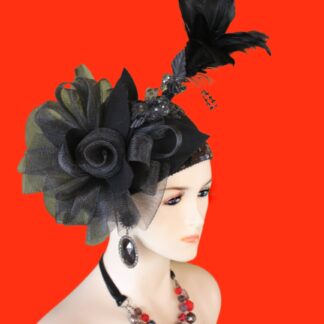 Women's Winter Wool Cloche Pillbox Old Hollywood Flapper Art Deco Fashion Designer Haute Couture Motf Premium Beaded Statement Hat Headpiece. This 1920's Style Winter Wool Fashion Hat Is Trimmed With Black Handmade Wool Embellishments, Interwined With A Large Crinoline Rosette Horsehair Black Bow. Placed With This Glamorous Bowing Is A Black Glass Beaded Sequin Rhinestone Handmade Feather Flower With Silk Leaves. Also Embellished On This Stunning Hat Are Handmade Black Beaded Sequin Rhinestone Appliques. Placed Around The Lower Crown Of This Art Deco Headpiece Is A Black Decorative Sequin Trim.