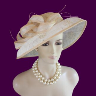 Women's Formal Haute Couture Big Brim Natural White And Beige Ivory Sinamay Straw Fashion Hat. This Decorative Wide Printed Brim Kentucky Derby Hat Is Embellished With A Large Bow And Embellishments. Feminine And Romantic.