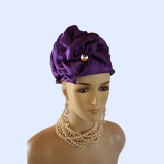 Women's Deep Purple Satin Couture Formal Pillbox Cocktail Wedding Church Hat. This Classic Styled Dressy Pillbox Holiday Hat Is Embellished With A Satin Bow Enhanced With A Rhinestone. This Bridal Mother Of The Bride Headpiece Can Be Worn With Embellishments Toward The Face Or To The Back Of The Head. This Elegant Satin Haute Couture Pillbox Hat Is Custom Made And Designed By NY Fashion Hats Couture Millinery. https://www.nyfashionhats.com. This New Collection Headpiece Is Part Of The Anastasia Konstandina Couture Headdress Line.